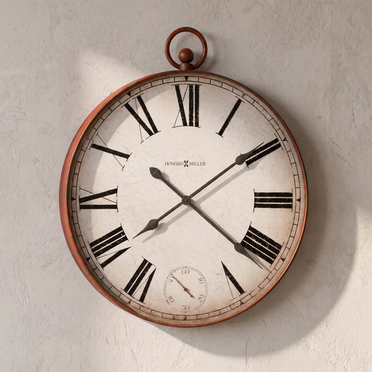 Howard Miller Gallery Pocket Watch II Wall Clock, close-up of the dial and finish detail