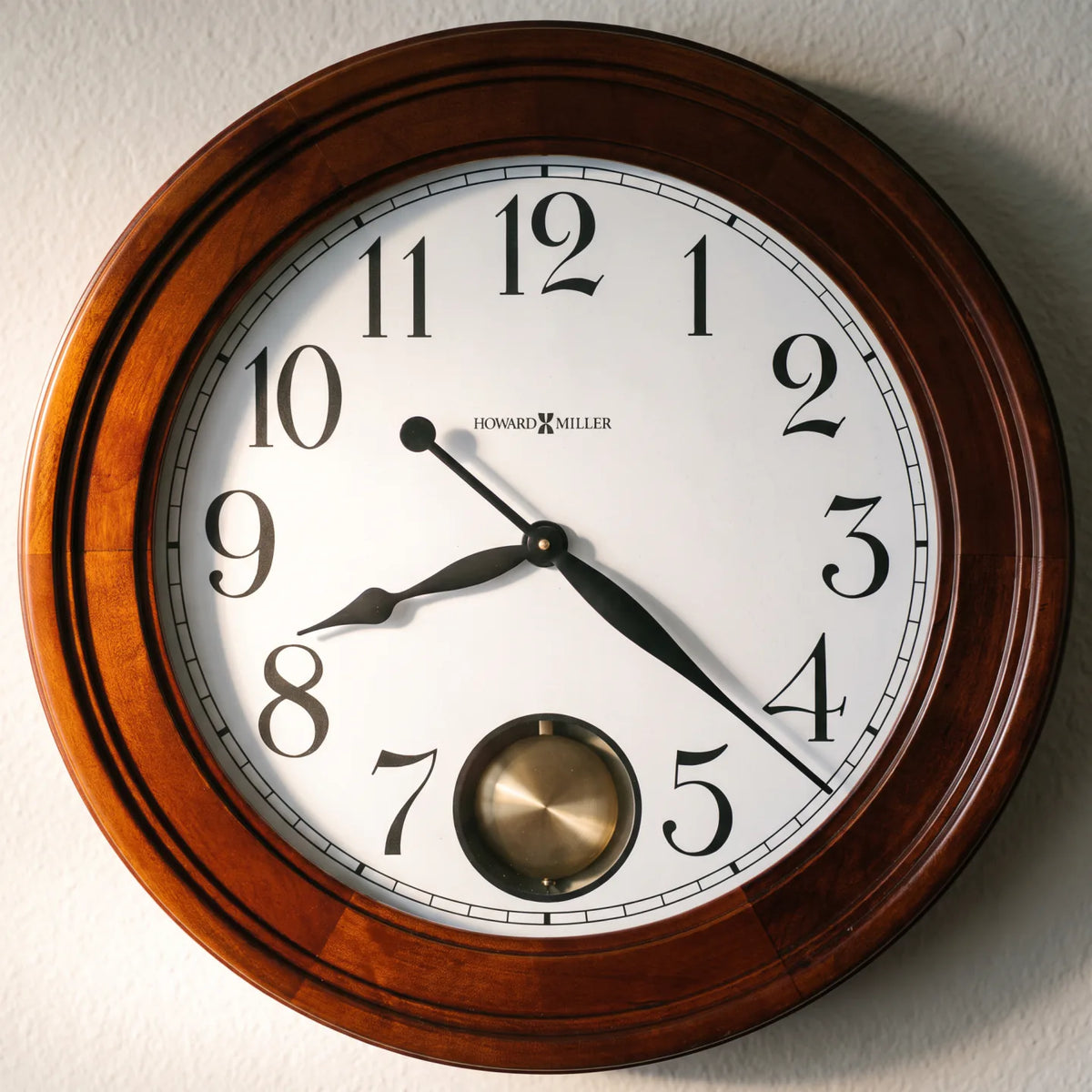Howard Miller Griffith Wall Clock, close-up of the dial and finish detail