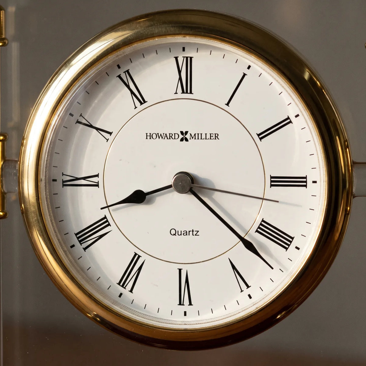 Howard Miller Kensington Tabletop Clock, close-up of the dial and finish detail