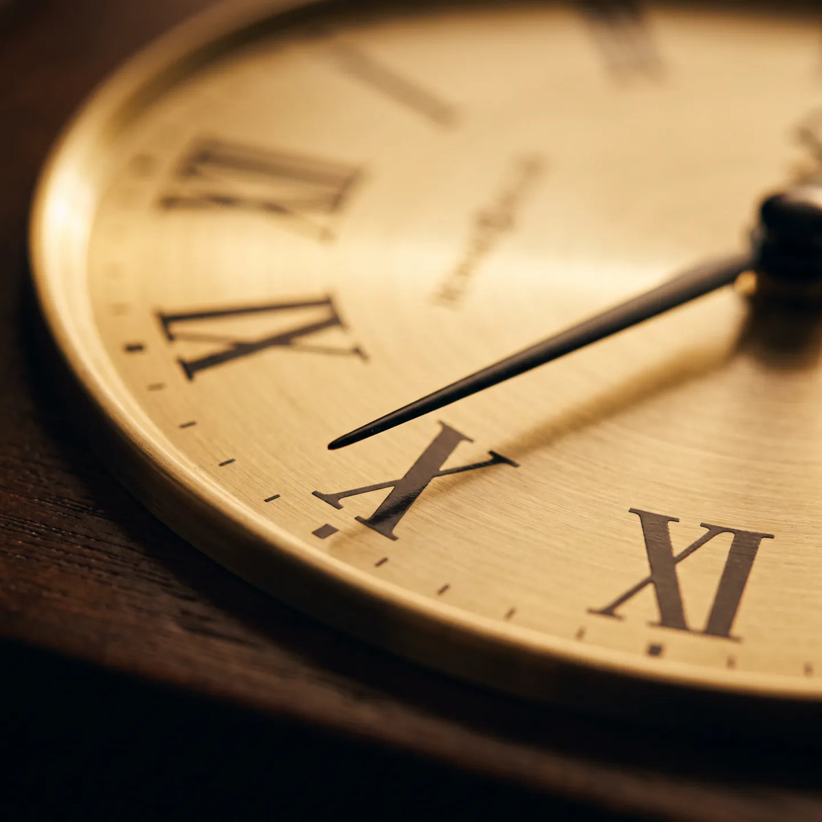 Howard Miller Agatha Wall Clock, macro close-up of the hands and dial