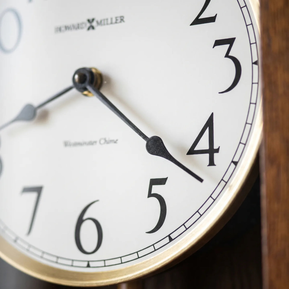Howard Miller Allegheny Wall Clock, macro close-up of the hands and dial