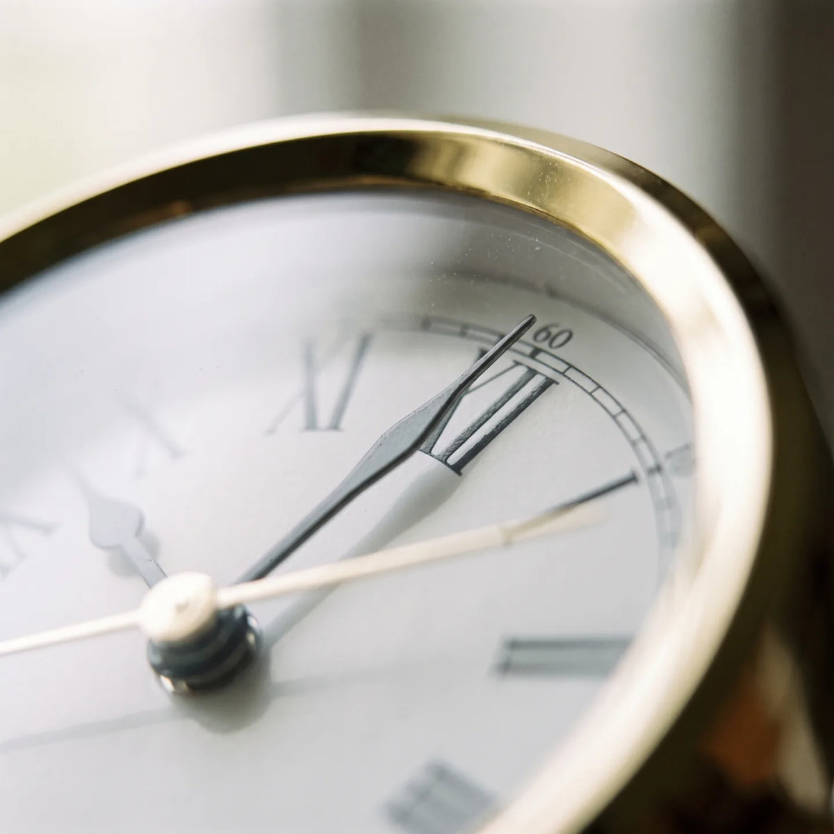 Howard Miller Bailey Tabletop Clock, macro close-up of the hands and dial