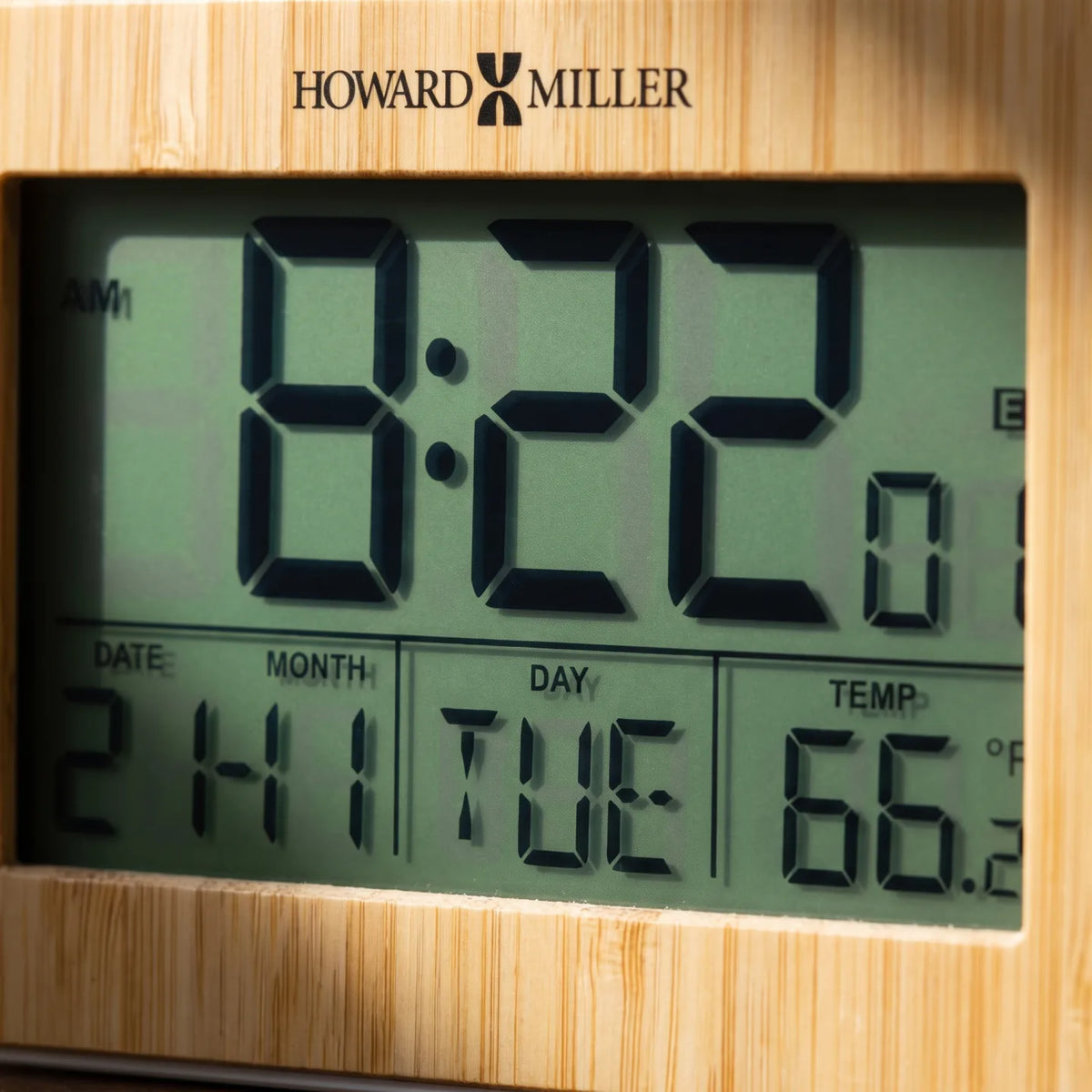Howard Miller Bamboo Box Alarm Clock, macro close-up of the hands and dial