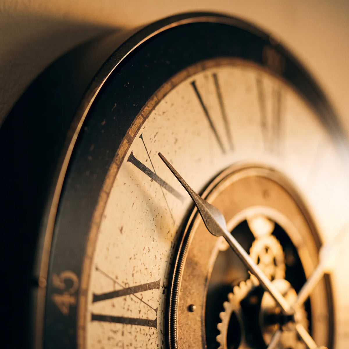 Howard Miller Brass Works Wall Clock, macro close-up of the hands and dial