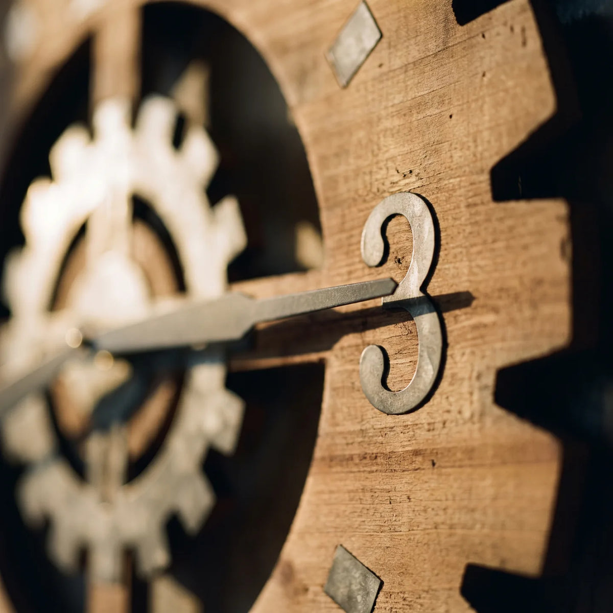 Howard Miller Cogwheel III Gallery Wall, macro close-up of the hands and dial