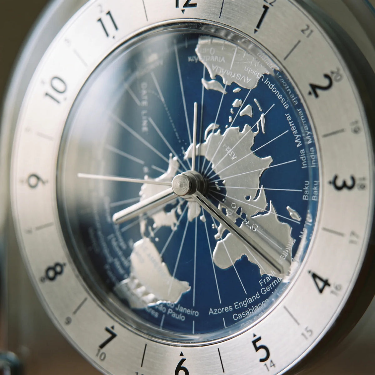 Howard Miller Discoverer Tabletop Clock, macro close-up of the hands and dial
