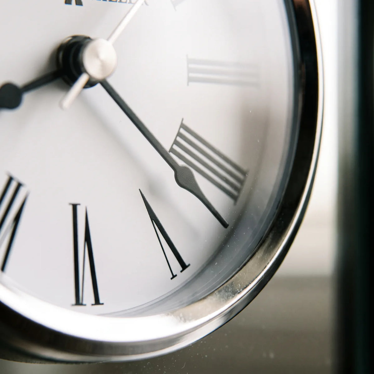 Howard Miller Glenmont Tabletop Clock, macro close-up of the hands and dial