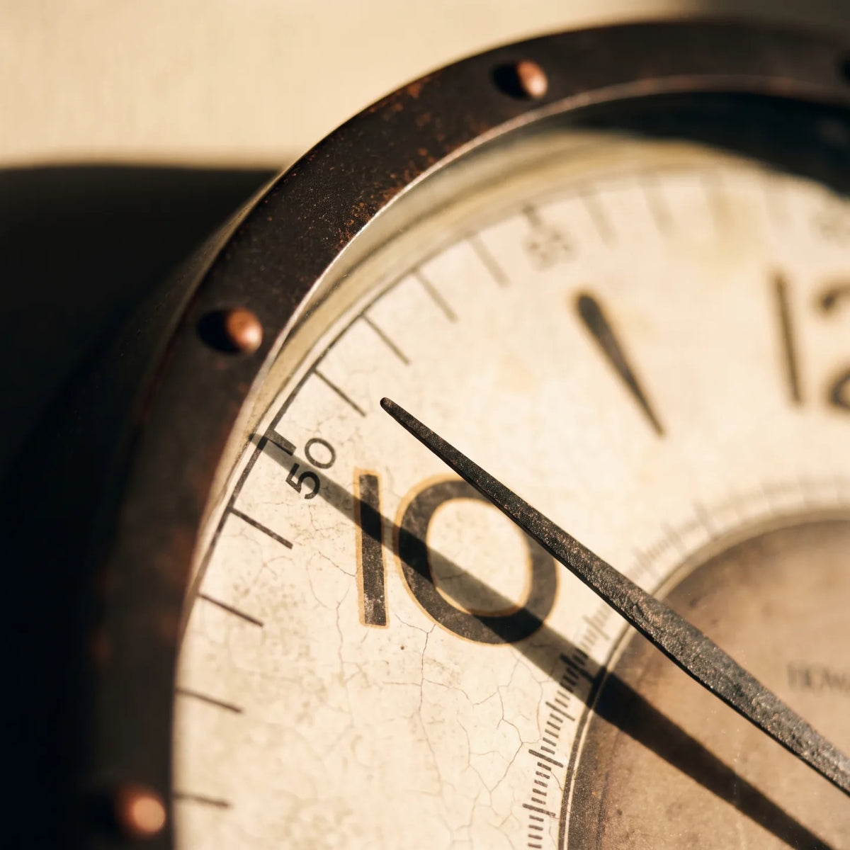 Howard Miller Kayden Gallery Wall Clock, macro close-up of the hands and dial