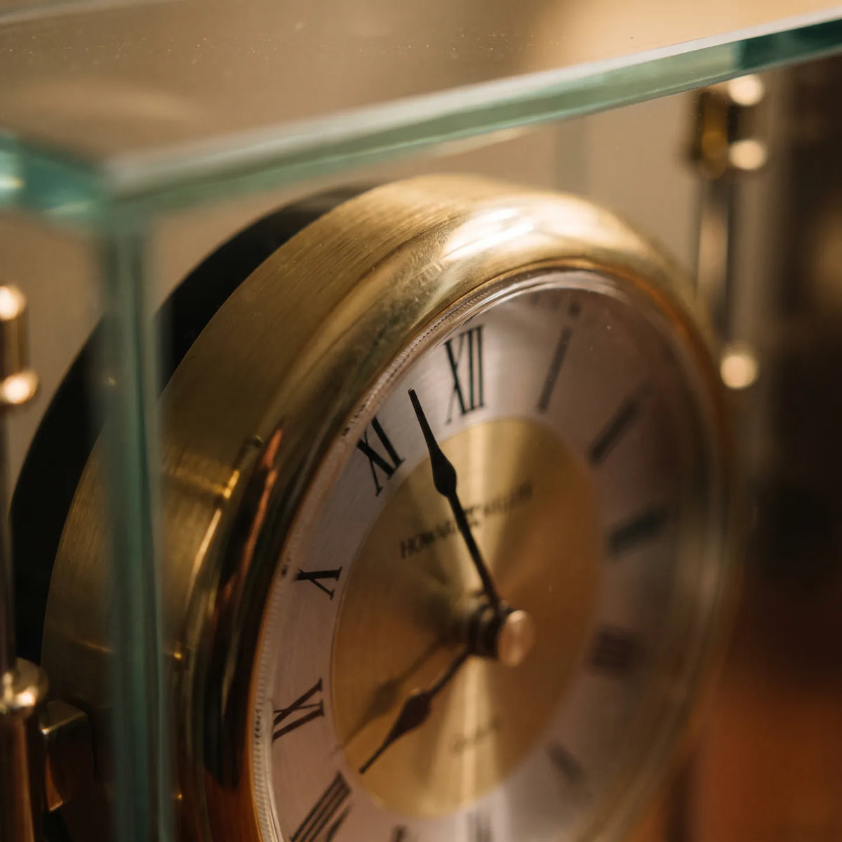 Howard Miller Kensington Tabletop Clock, macro close-up of the hands and dial