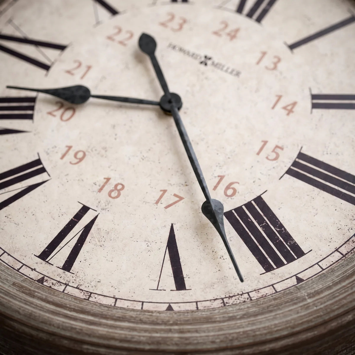 Howard Miller Nesto Wall Clock, macro close-up of the hands and dial