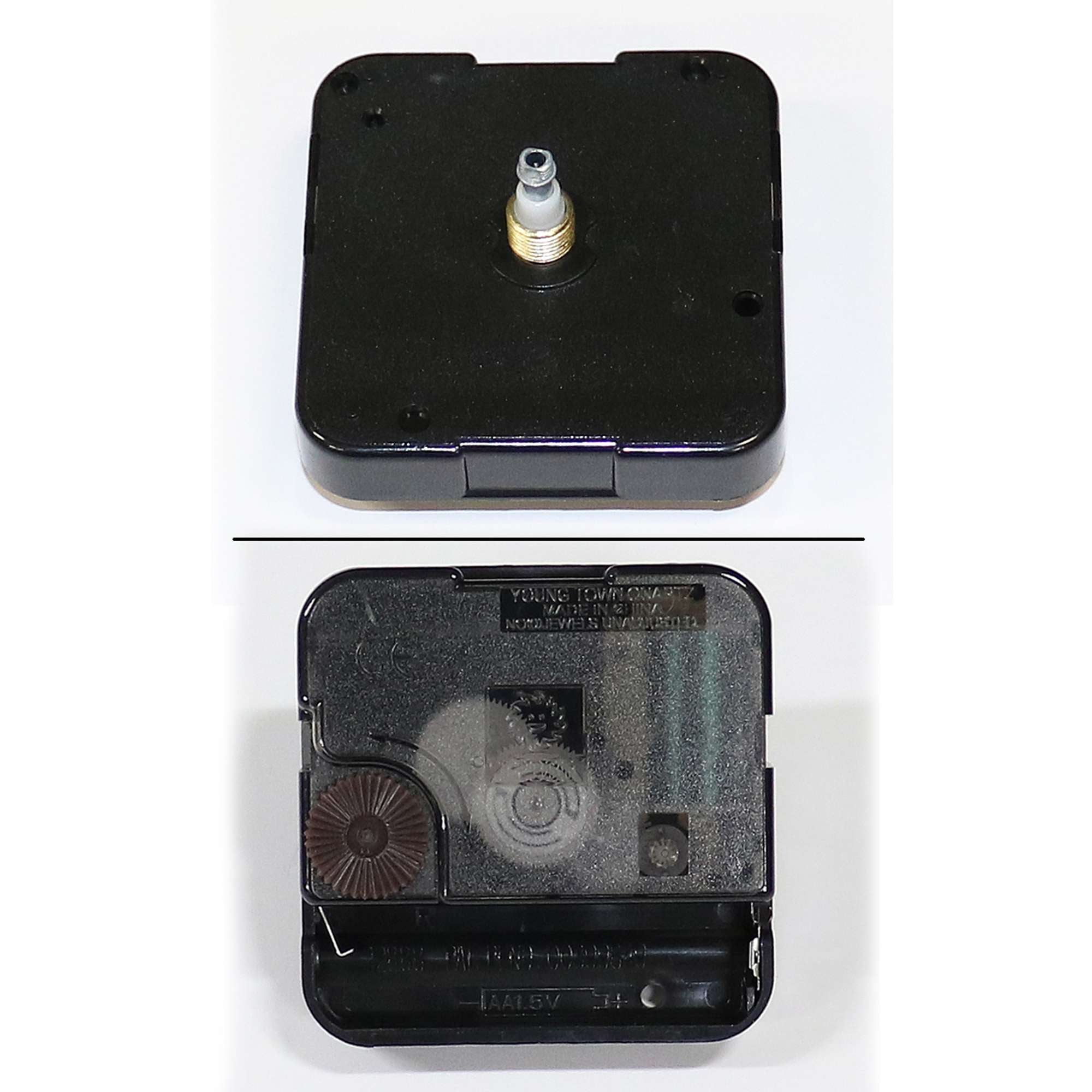 Black clock movement mechanism with visible components