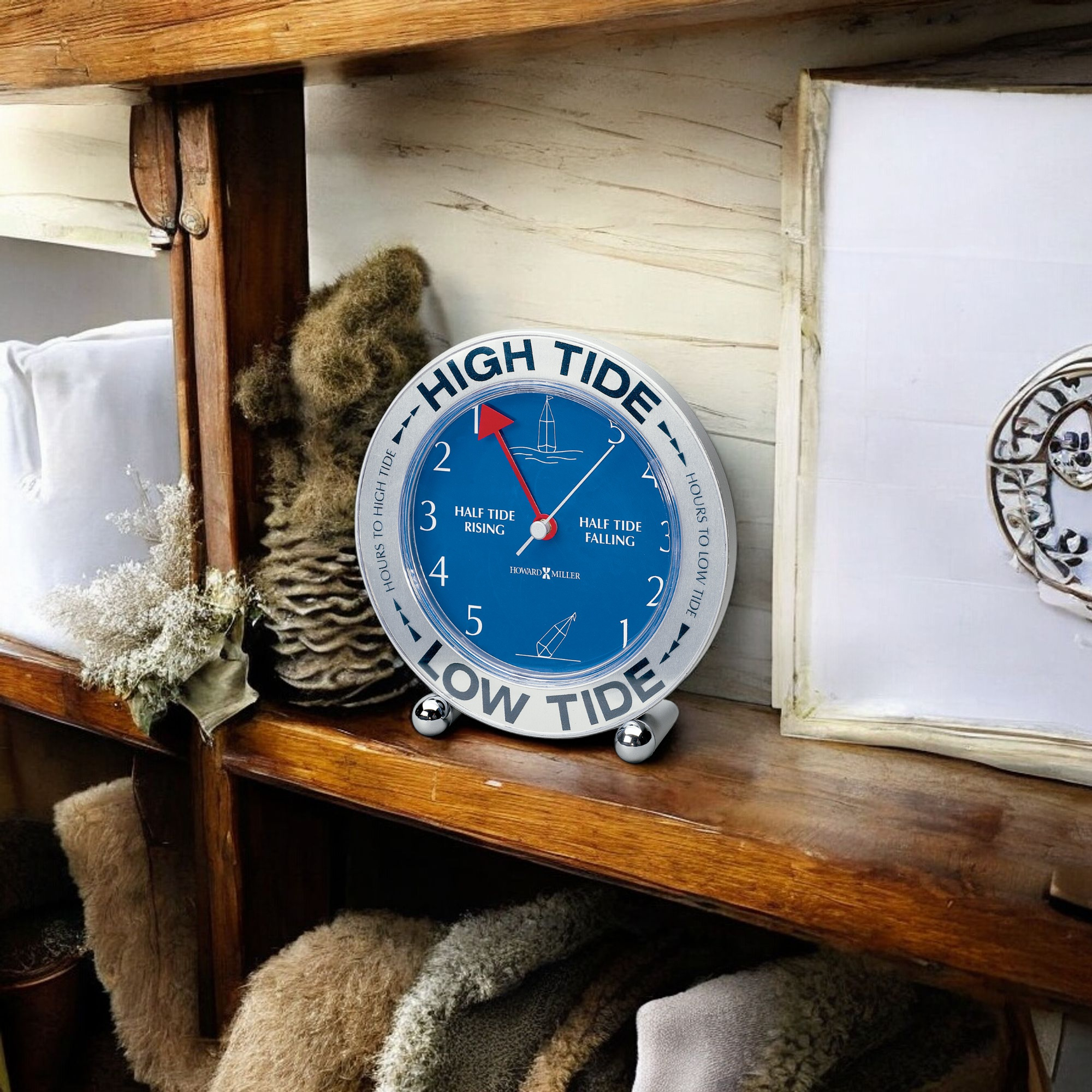 A decorative tide clock displaying high and low tide information.