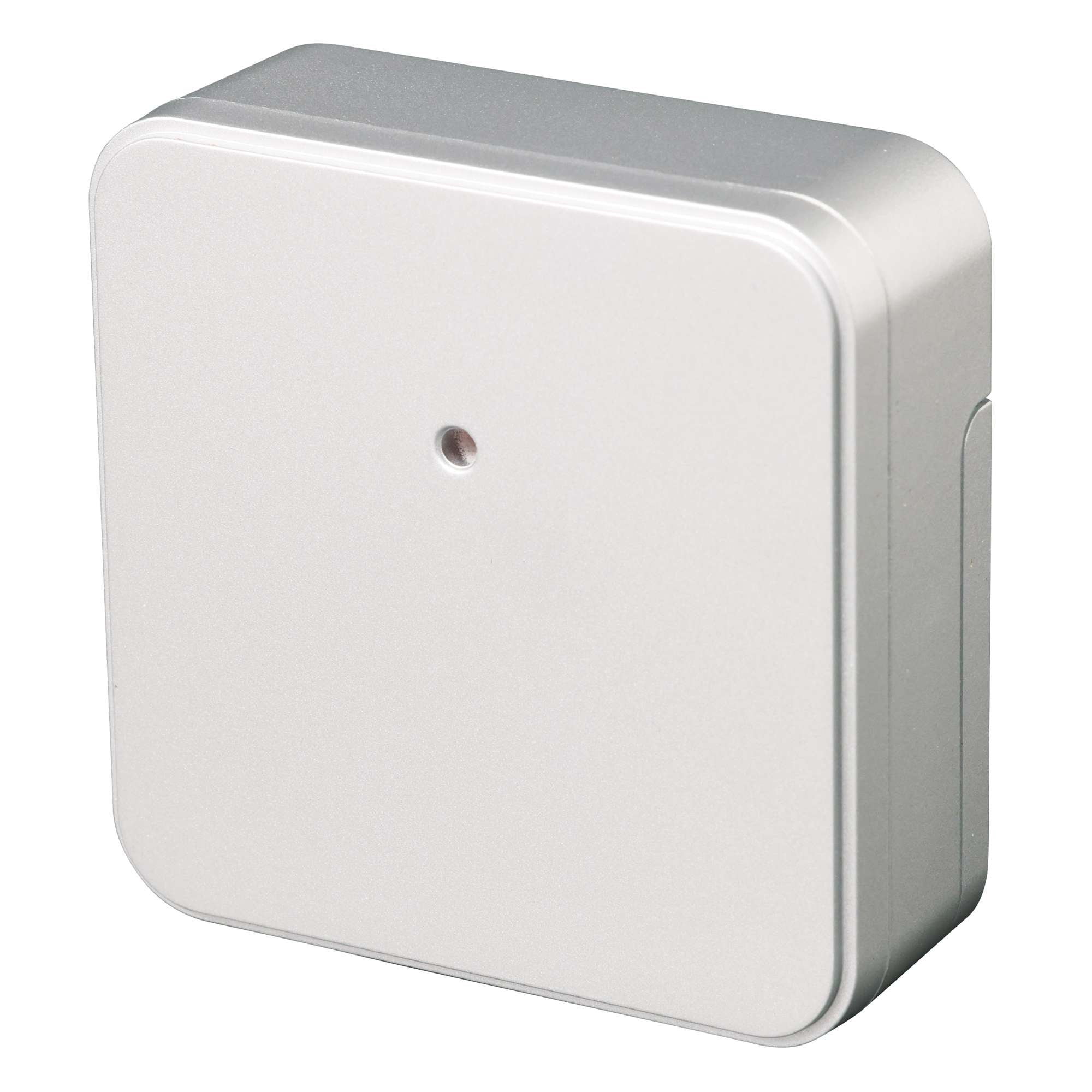 A rectangular white electronic device with a small circular opening in the center.