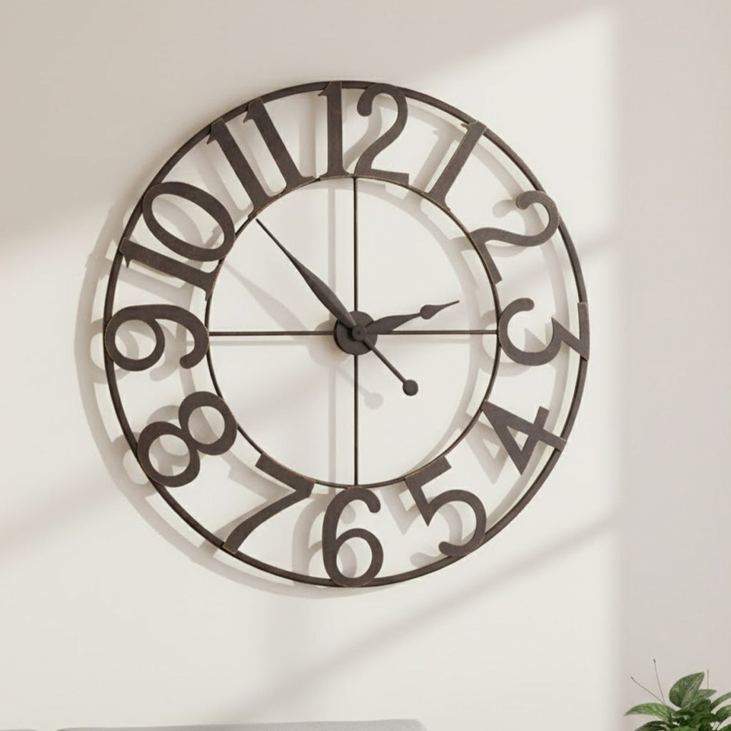 Large round metal wall clock, dark brown, featuring bold numbers and a minimalist design for home decor.