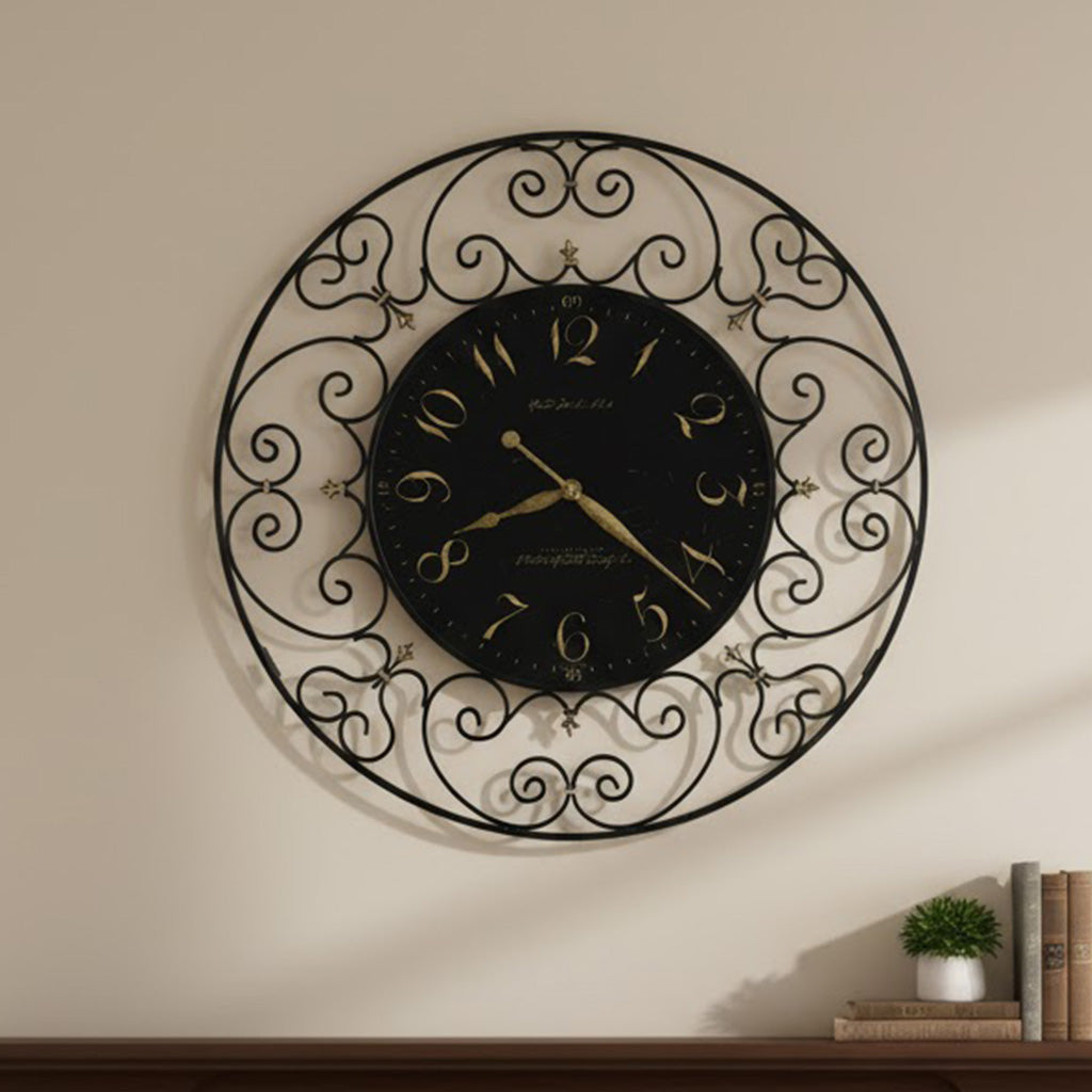 Elegant black wall clock with gold accents and ornate metal frame, perfect for stylish home decor.