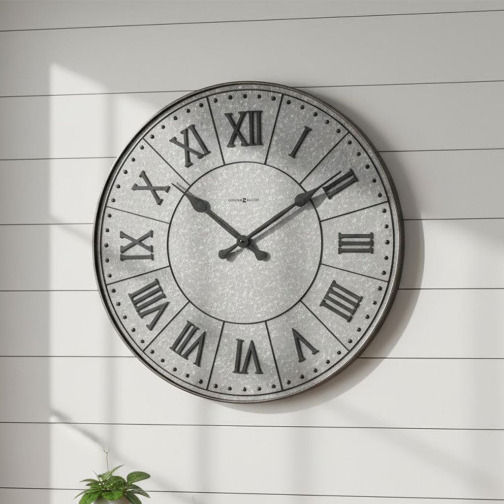 Vintage-style wall clock with silver finish and Roman numerals, perfect for home decor.