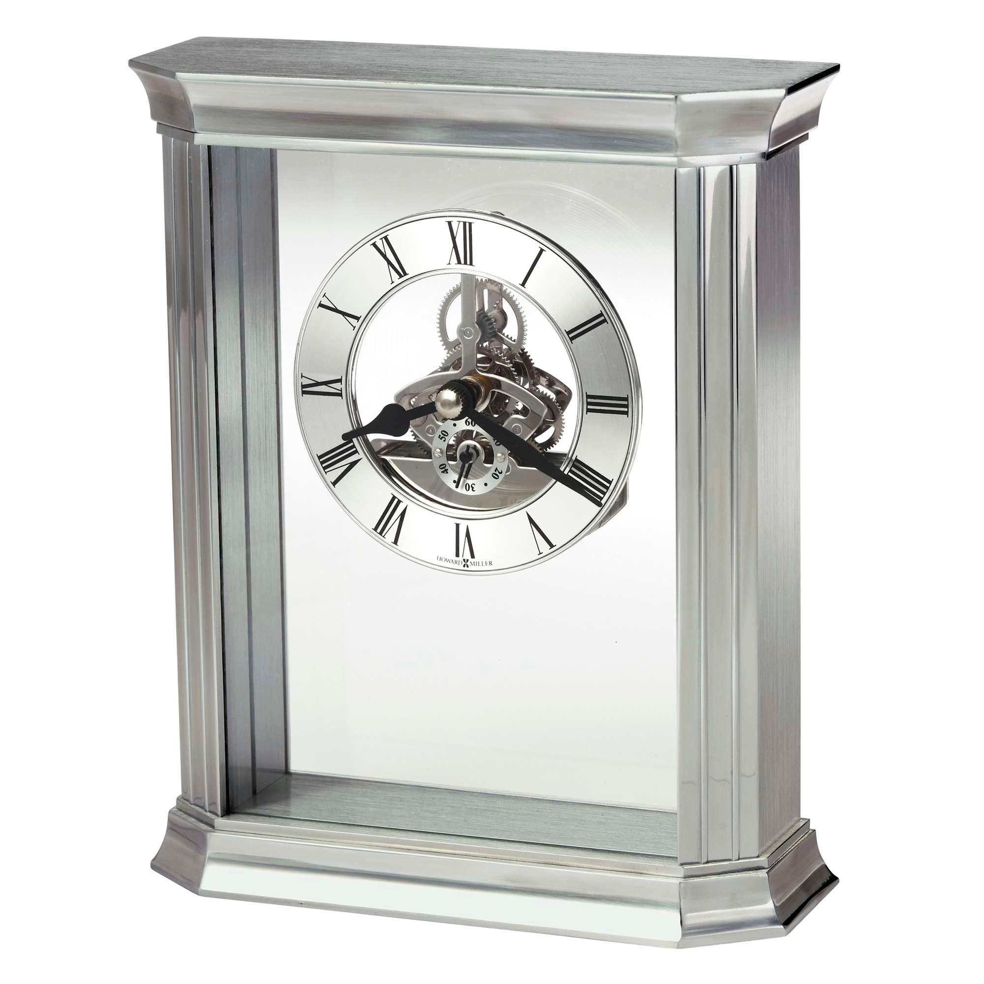 A silver-colored tabletop clock with a round face and Roman numerals.
