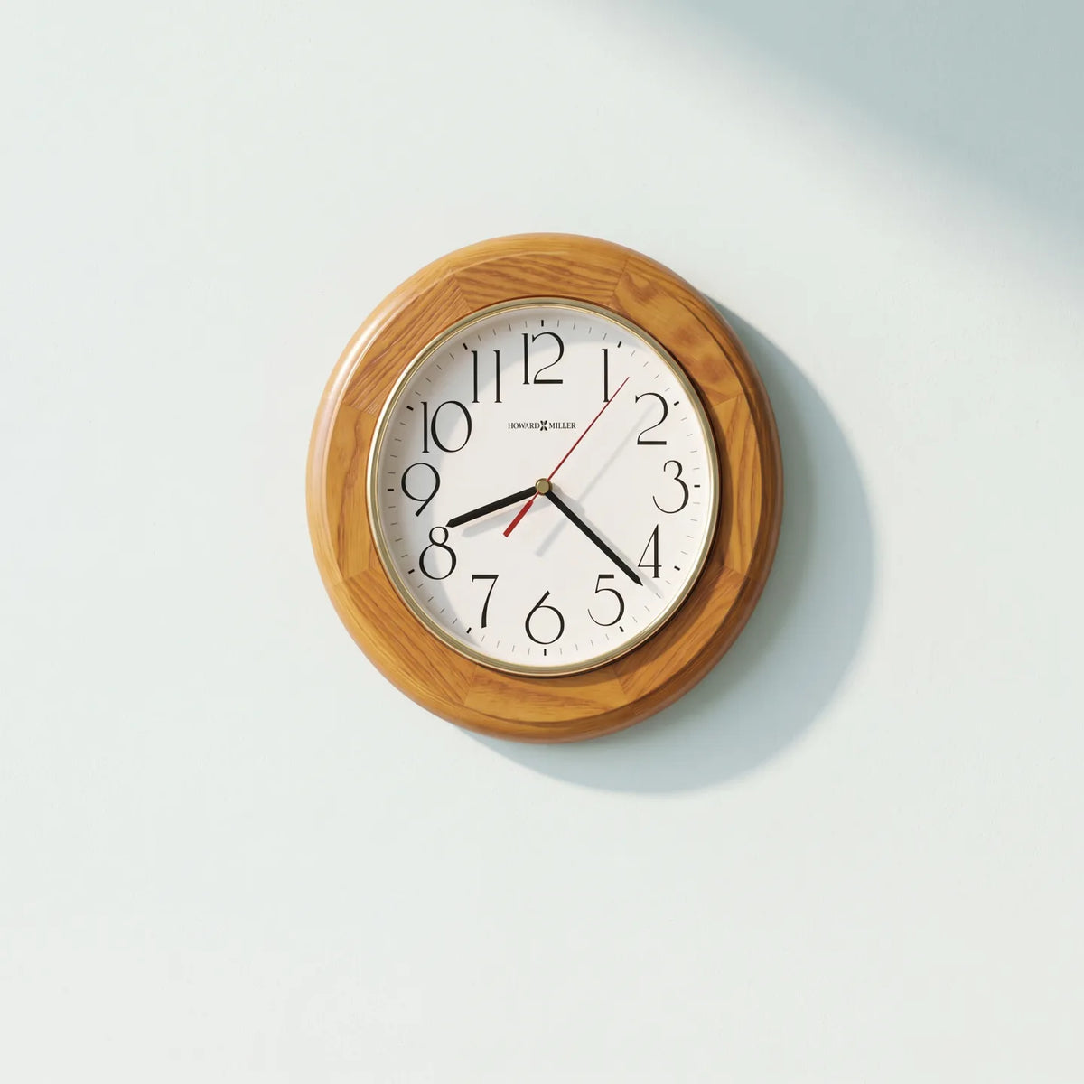 Howard Miller Grantwood Wall Clock, 12-inch, front view on a plain white background