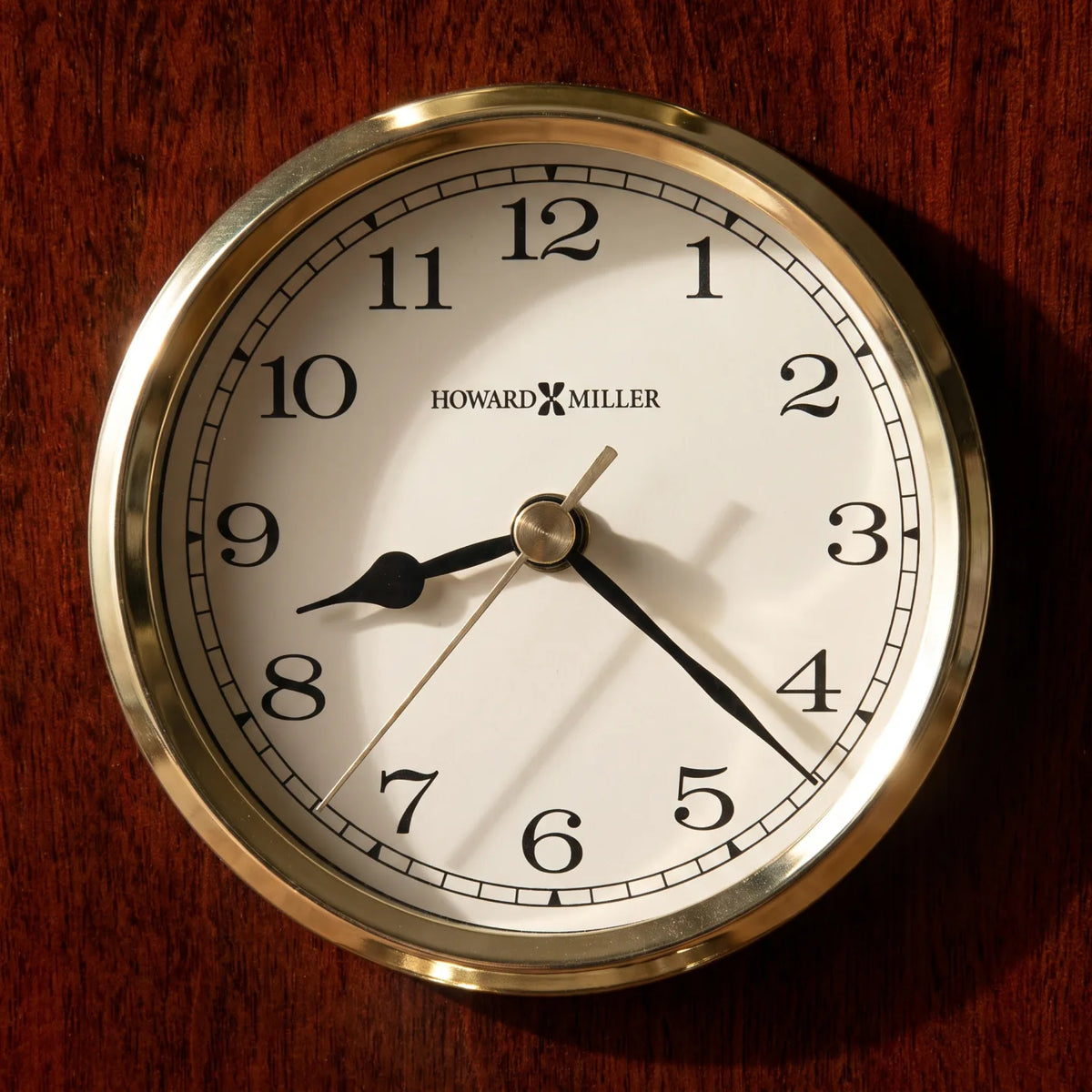 Howard Miller Shore Station Wall Clock, close-up of the dial and finish detail