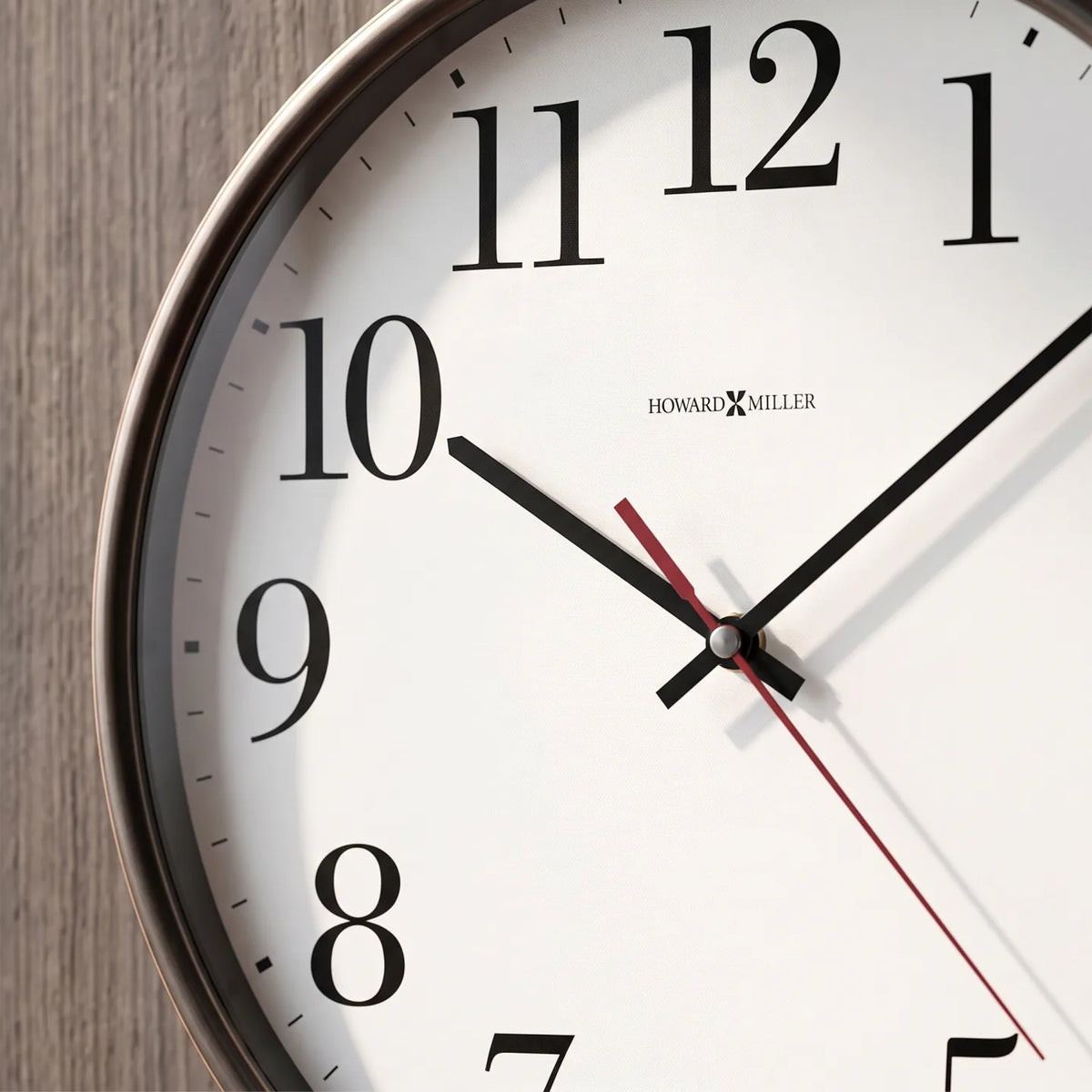 Howard Miller Office Mate Wall Clock, close-up of the dial and finish detail