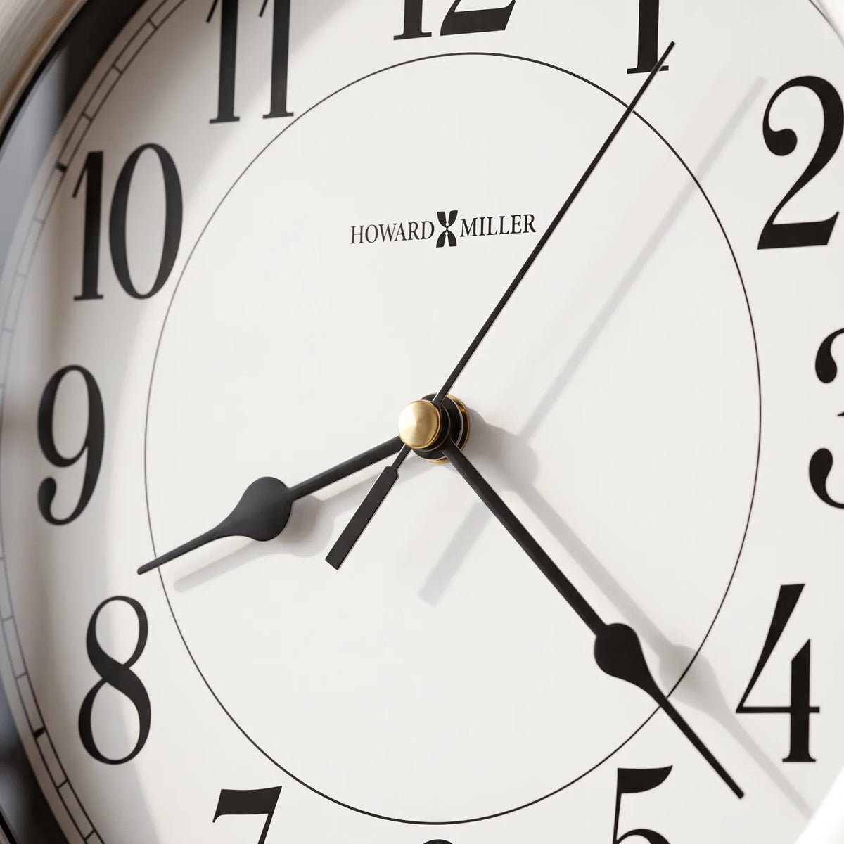 Howard Miller Aries Wall Clock, close-up of the dial and finish detail