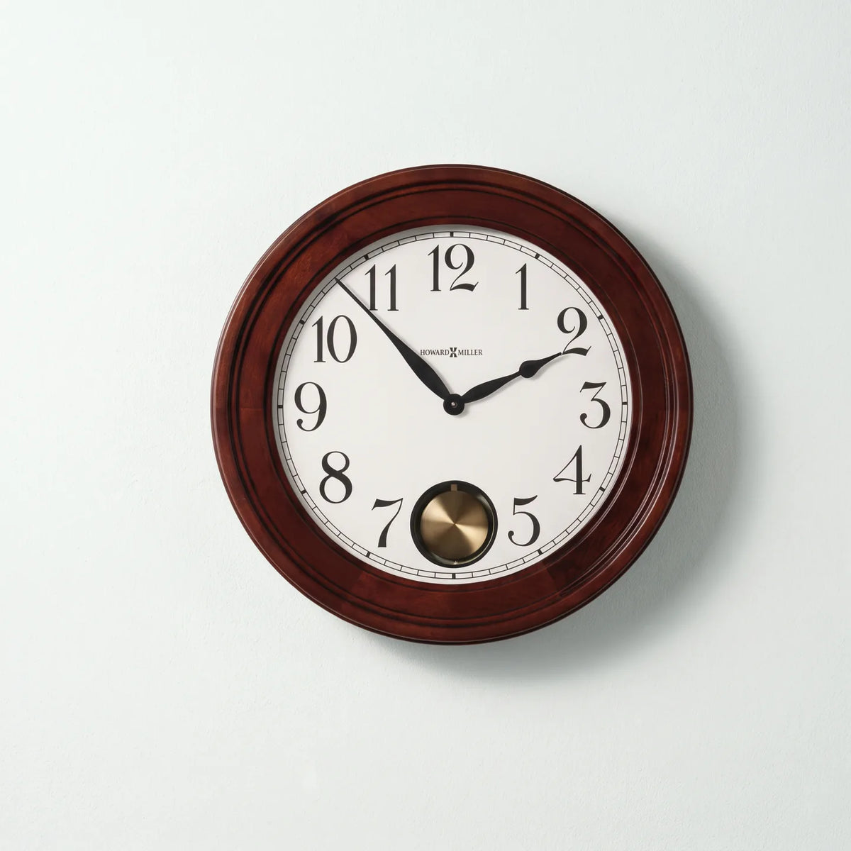 Howard Miller Griffith Wall Clock, 25-inch, front view on a plain white background