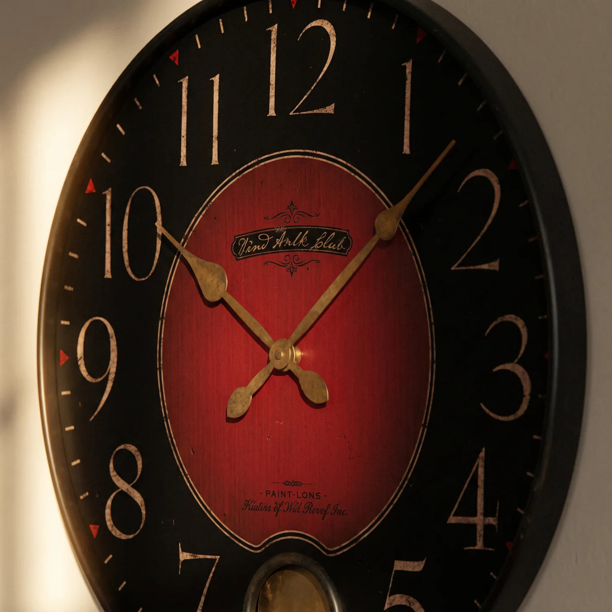 Howard Miller Harmon Wall Clock, close-up of the dial and finish detail