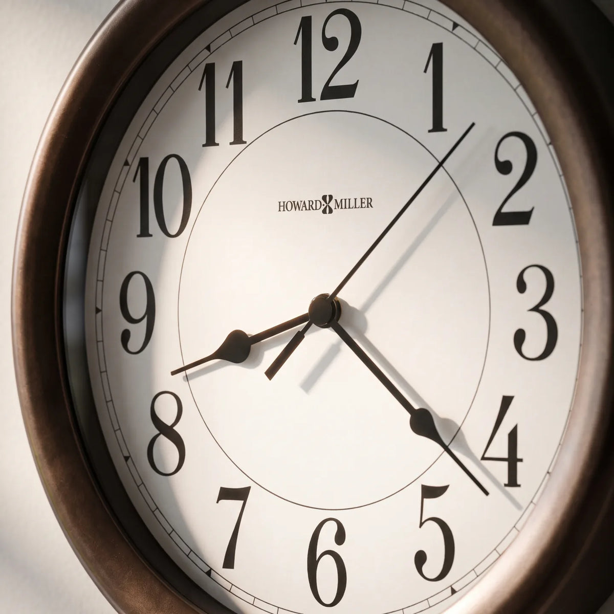 Howard Miller Virgo Wall Clock, close-up of the dial and finish detail