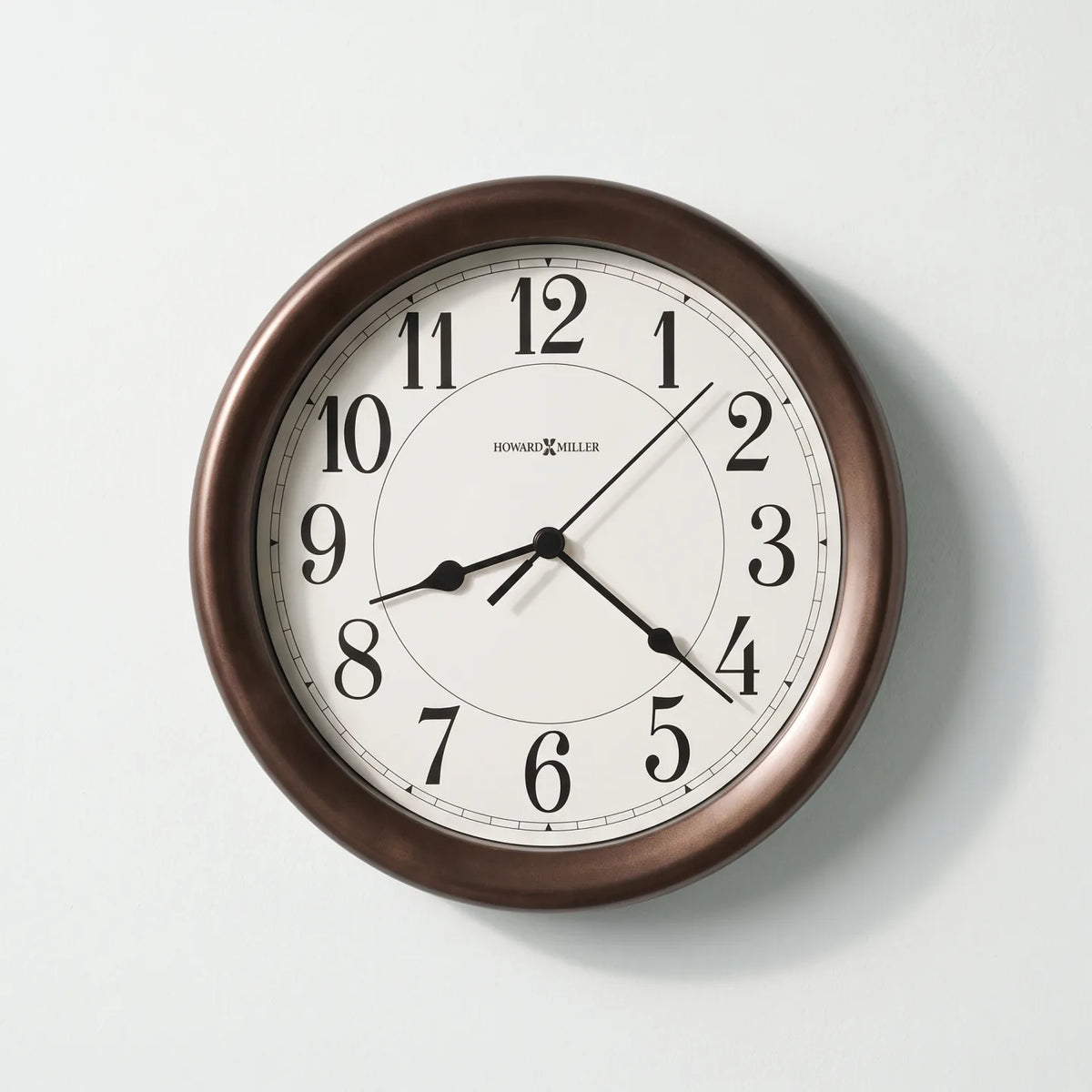 Howard Miller Virgo Wall Clock, 8-inch, front view on a plain white background