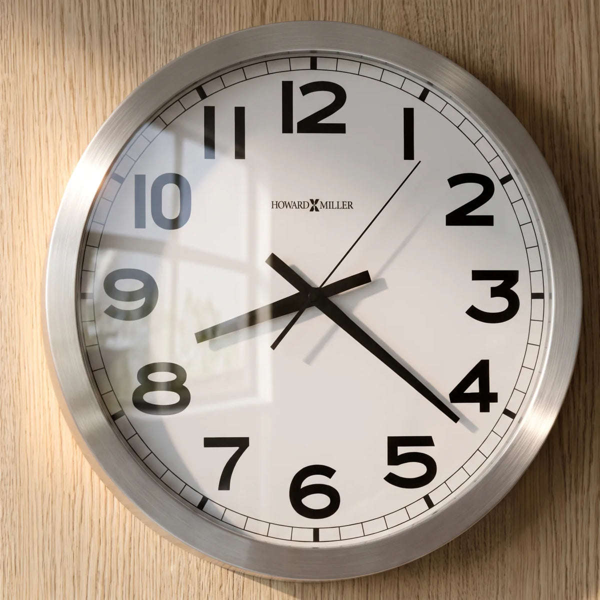 Howard Miller Spokane Wall Clock, close-up of the dial and finish detail