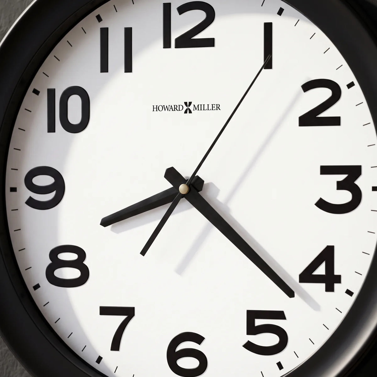Howard Miller Kenwick Wall Clock, close-up of the dial and finish detail
