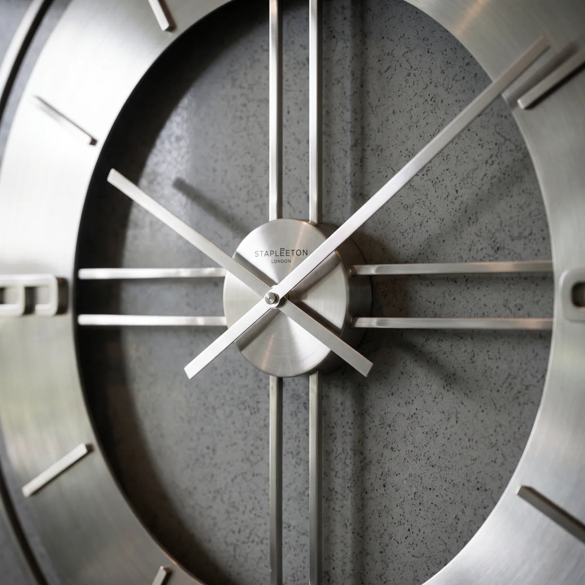 Howard Miller Stapleton Wall Clock, close-up of the dial and finish detail