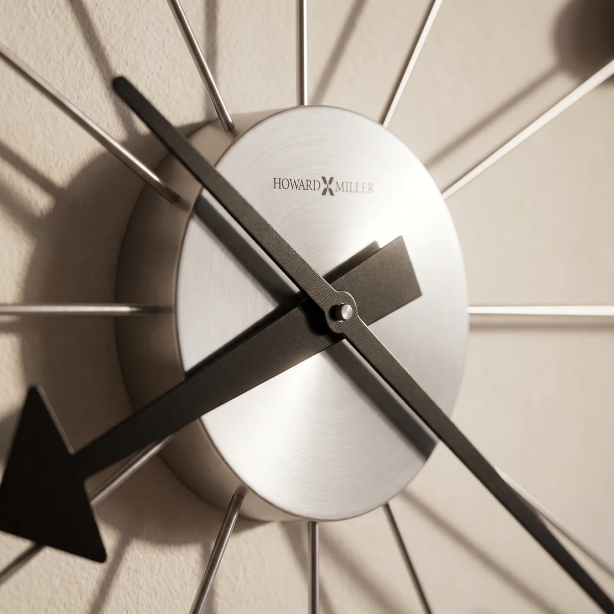 Howard Miller Ball Clock II Wall Clock, close-up of the dial and finish detail
