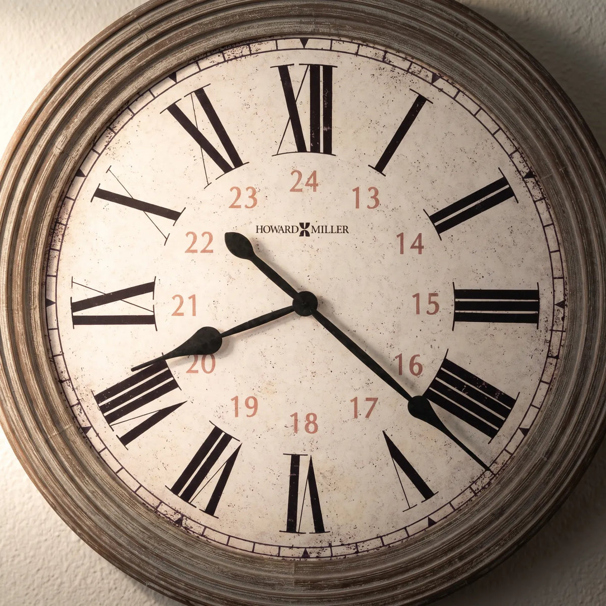Howard Miller Nesto Wall Clock, close-up of the dial and finish detail