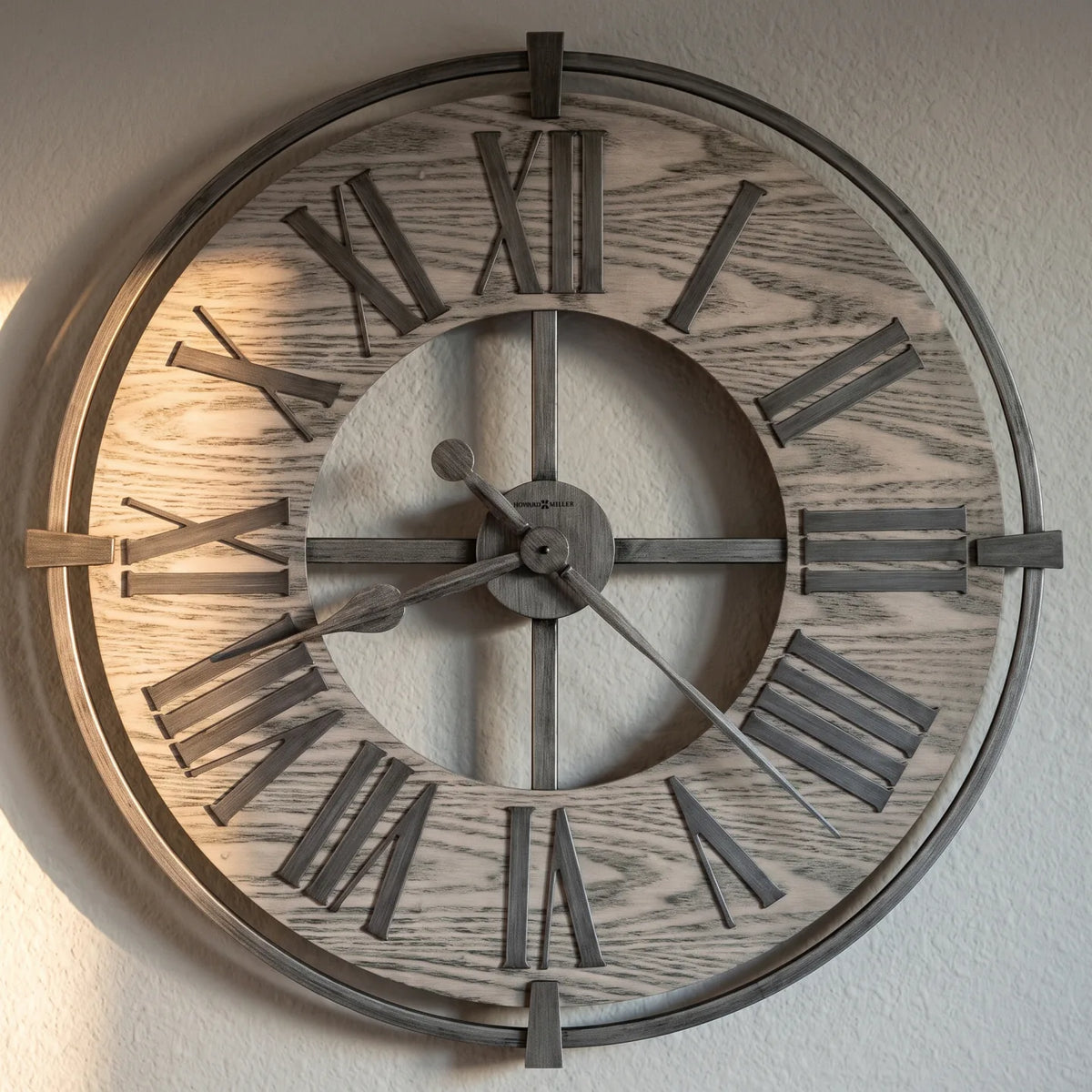 Howard Miller Eli Wall Clock, close-up of the dial and finish detail