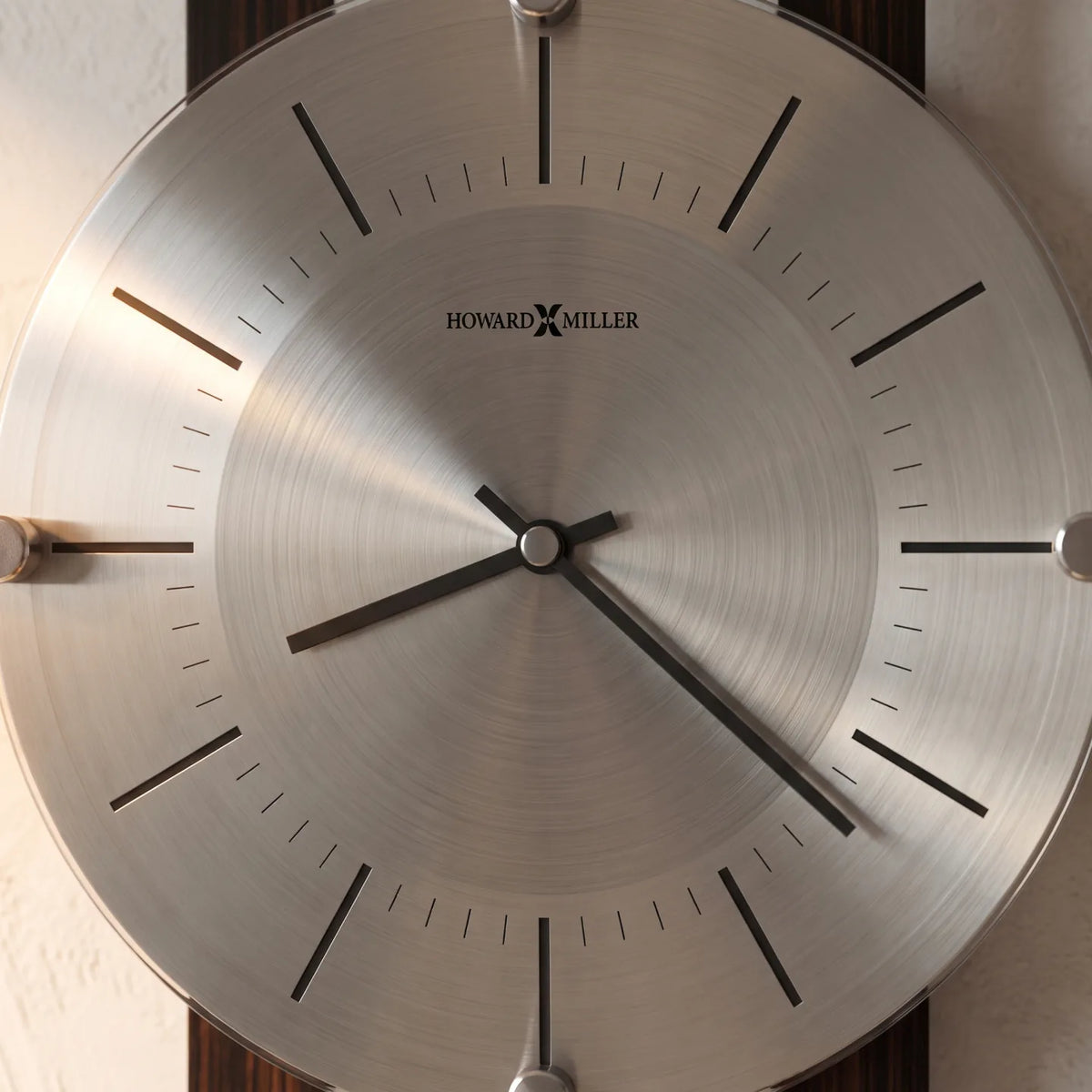 Howard Miller Mela Wall Clock, close-up of the dial and finish detail
