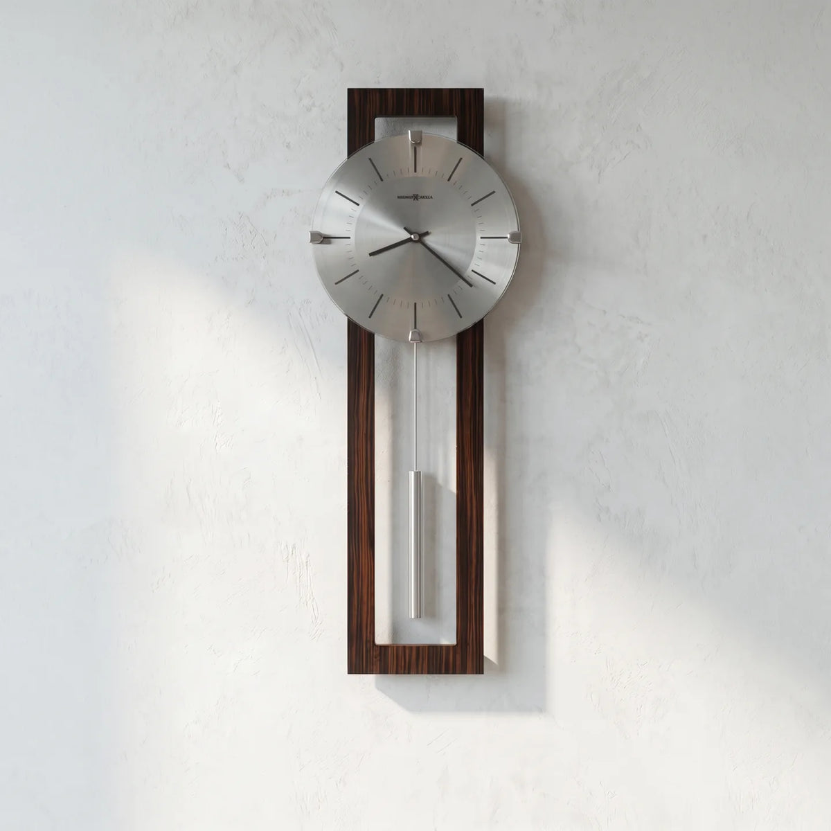 Howard Miller Mela Wall Clock, 24-inch, front view on a plain white background