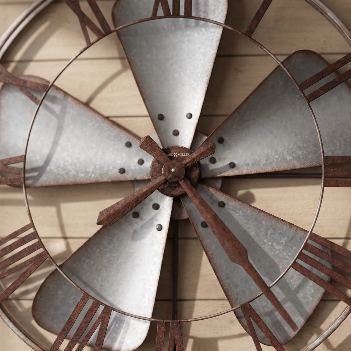 Howard Miller Mill Shop Wall Clock, close-up of the dial and finish detail