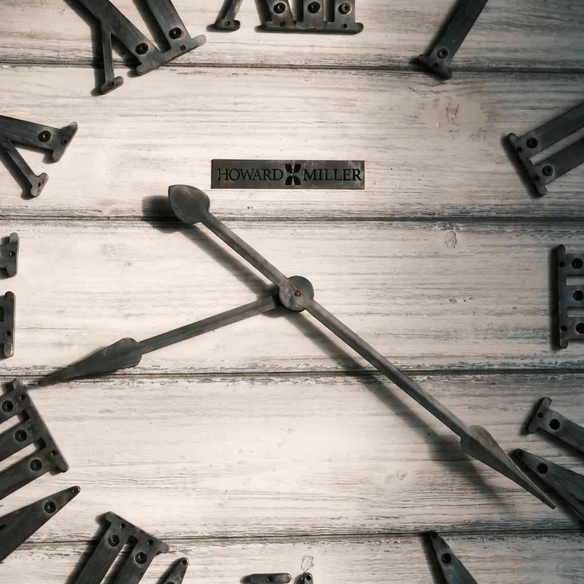 Howard Miller West Grove Gallery Wall Clock, close-up of the dial and finish detail