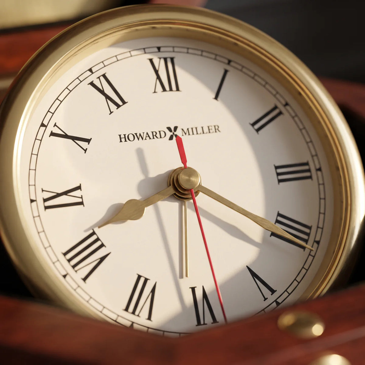 Howard Miller Chronometer Tabletop Clock, close-up of the dial and finish detail