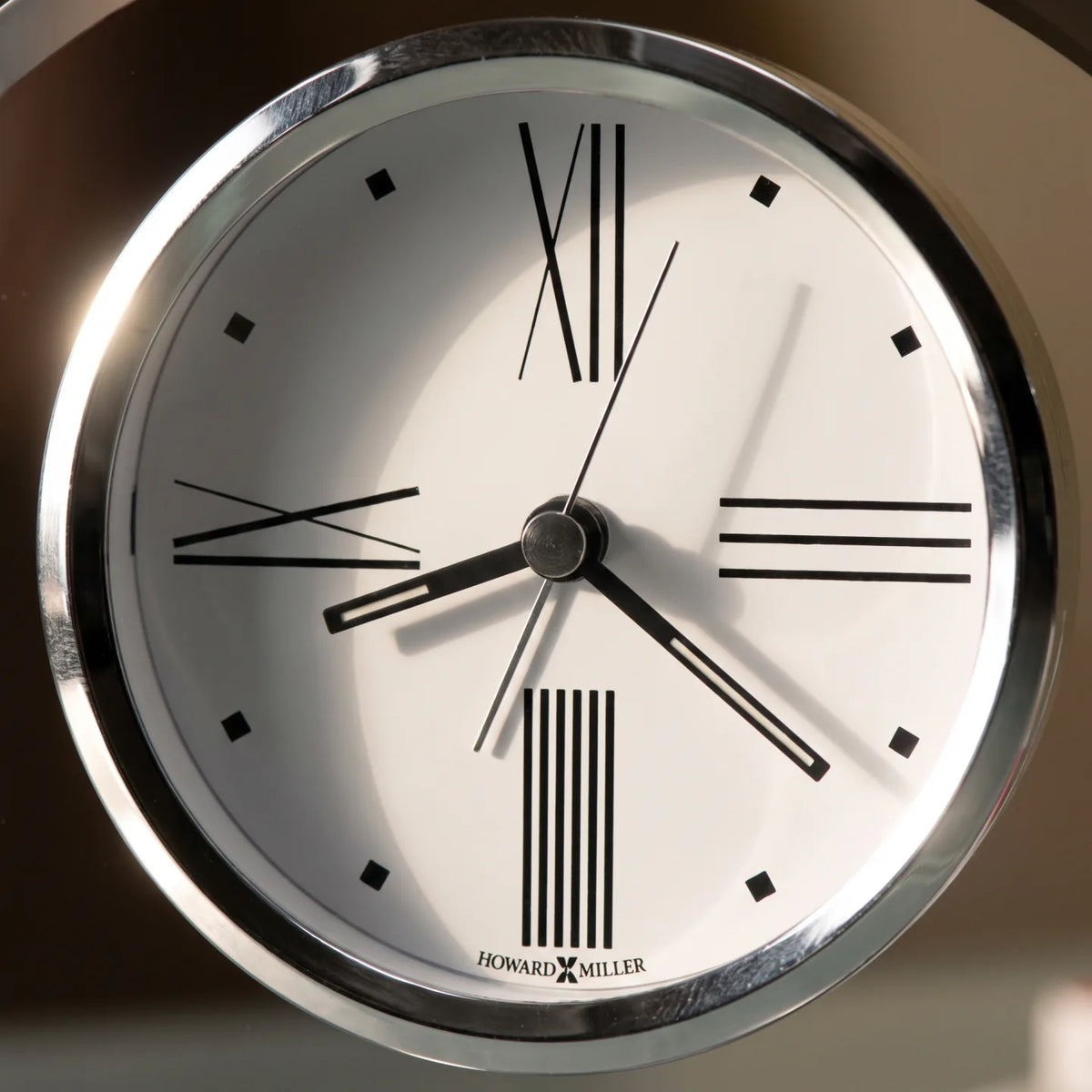 Howard Miller Tribeca Tabletop Clock, close-up of the dial and finish detail