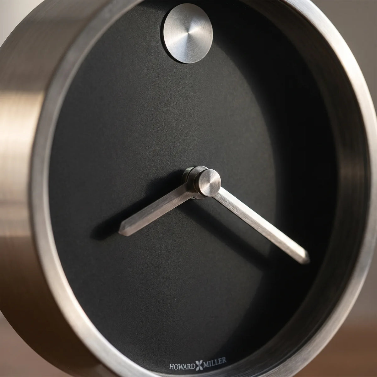 Howard Miller Aurora Tabletop Clock, close-up of the dial and finish detail