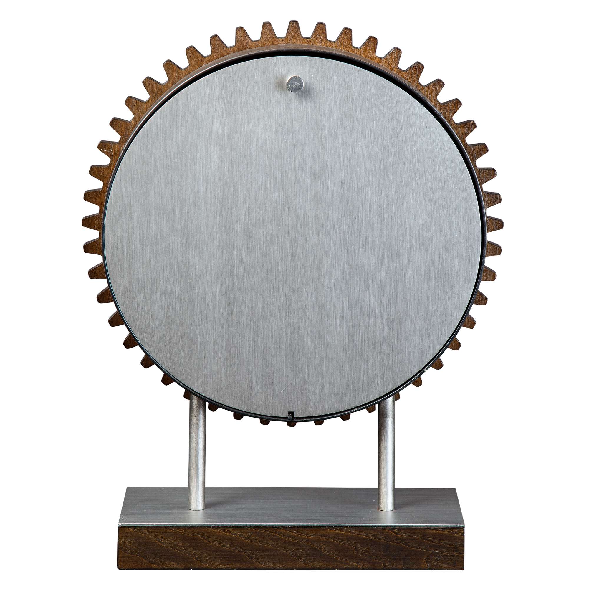 A modern decorative gear sculpture with a metal circular disc and wooden base.