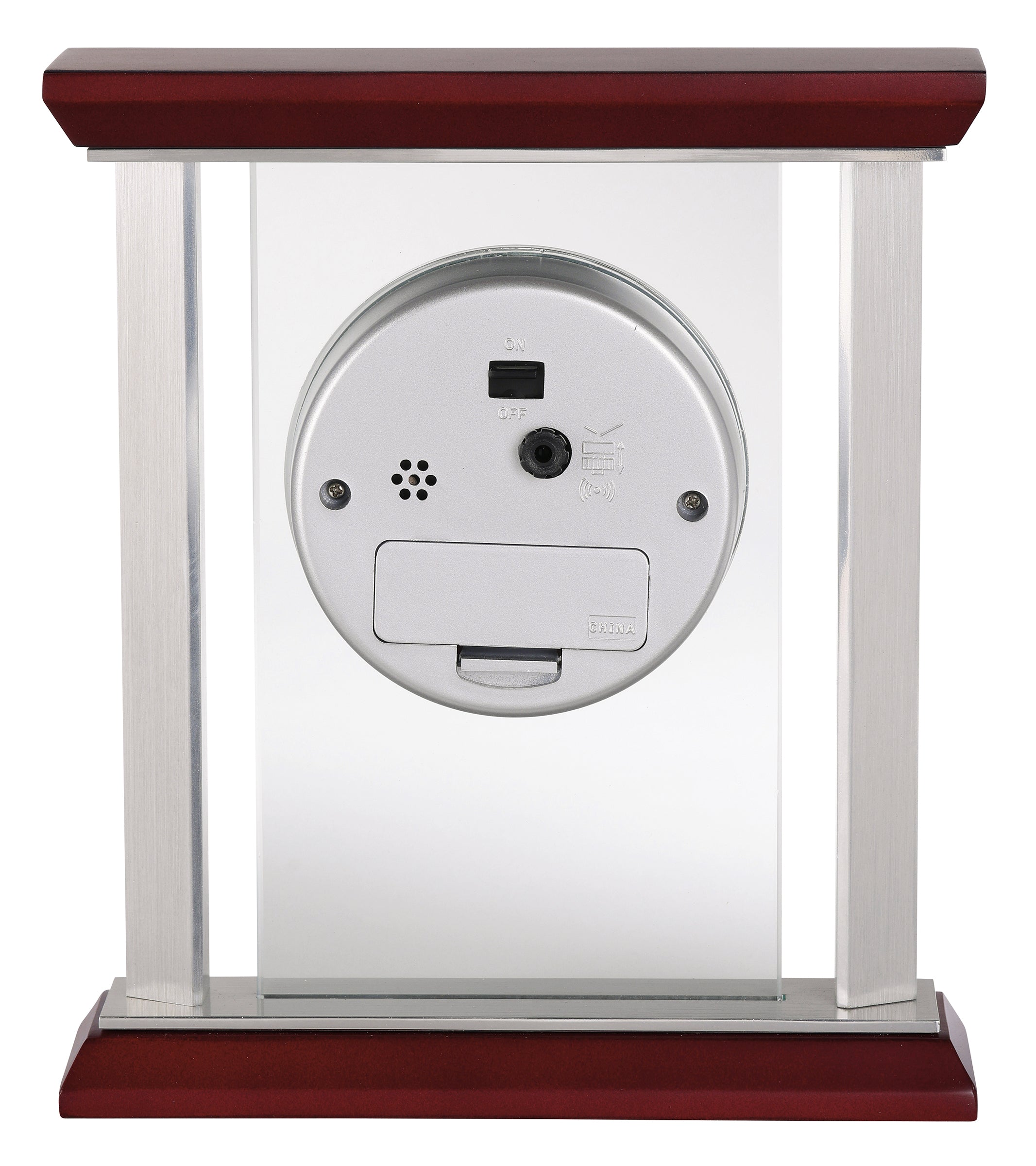 A decorative frame with a circular device featuring buttons and a camera.
