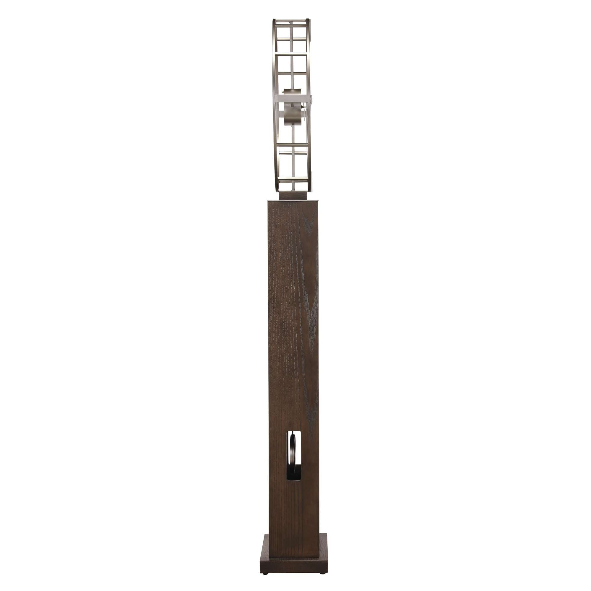 Modern decorative sculpture featuring a tall wooden base and abstract metal design on top.