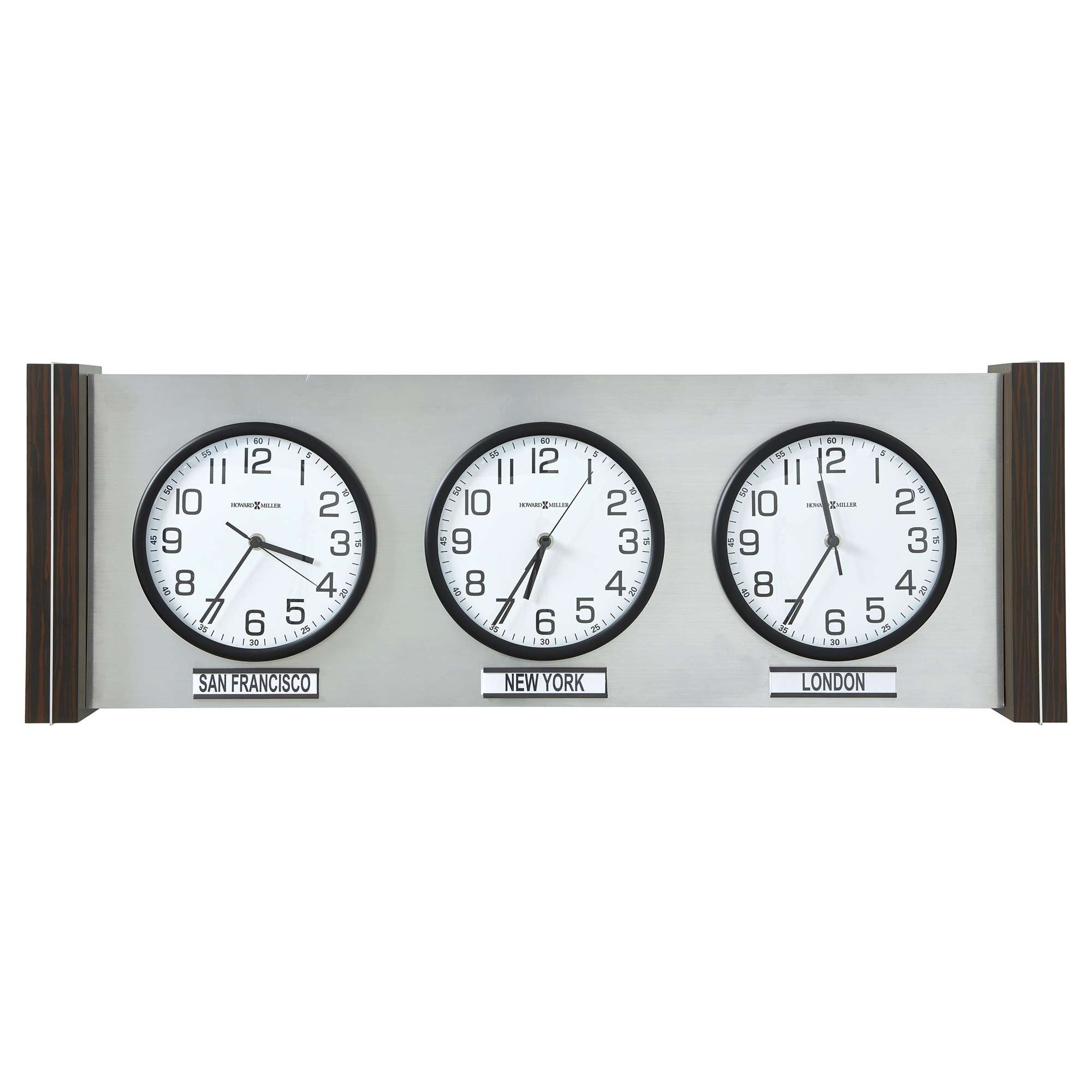 A wall clock displaying three time zones with black frames and white faces.