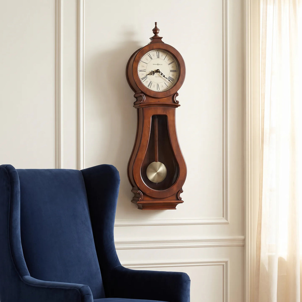 Howard Miller Arendal Wall Clock, 30-inch, on the wall in a styled room