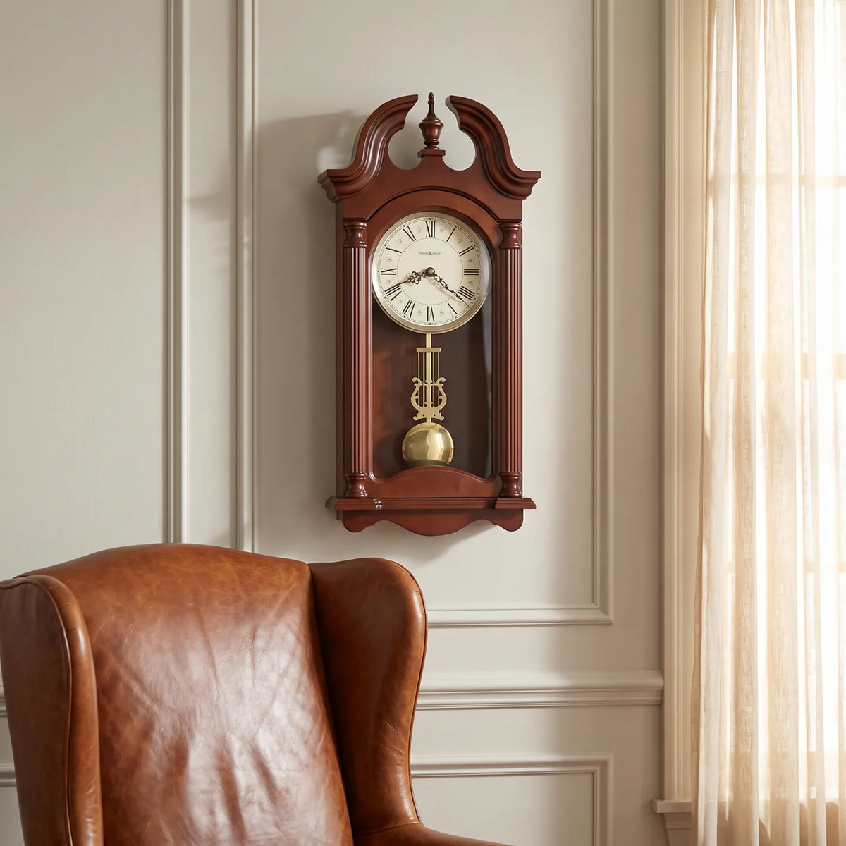 Howard Miller Everett Wall Clock, 26-inch, on the wall in a styled room