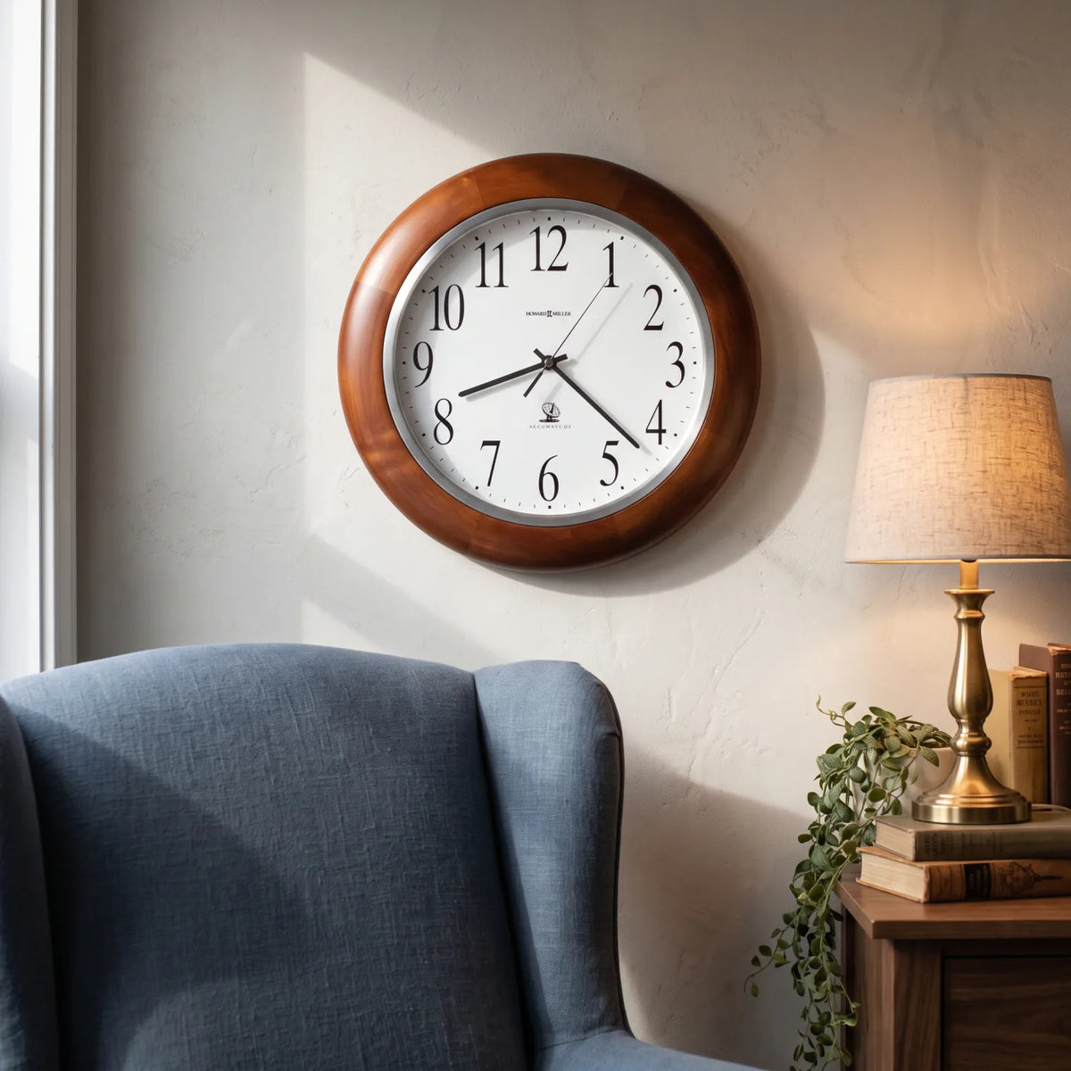 Howard Miller Murrow Wall Clock, 14-inch, on the wall in a styled room