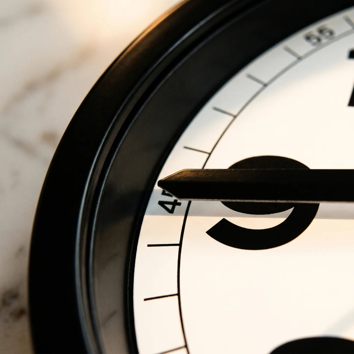 Howard Miller Accuwave II Wall Clock, macro close-up of the hands and dial
